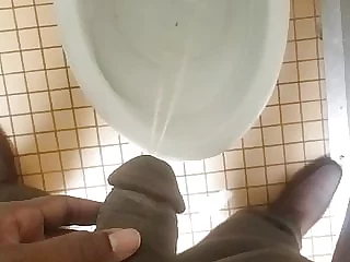 black dick pissing